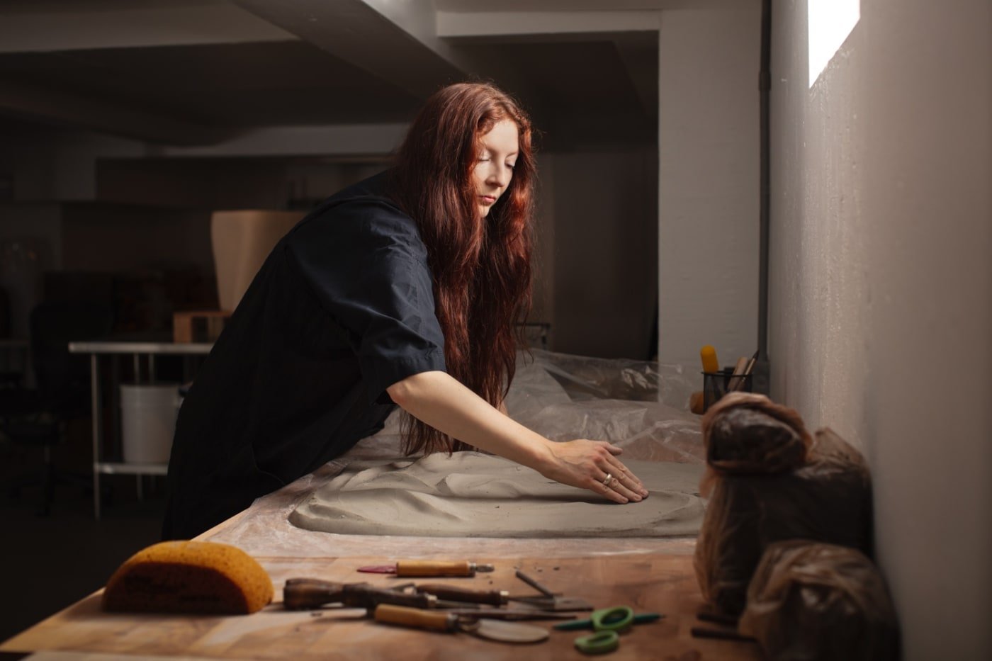 Natalia Engelhardt working with clay in her studio